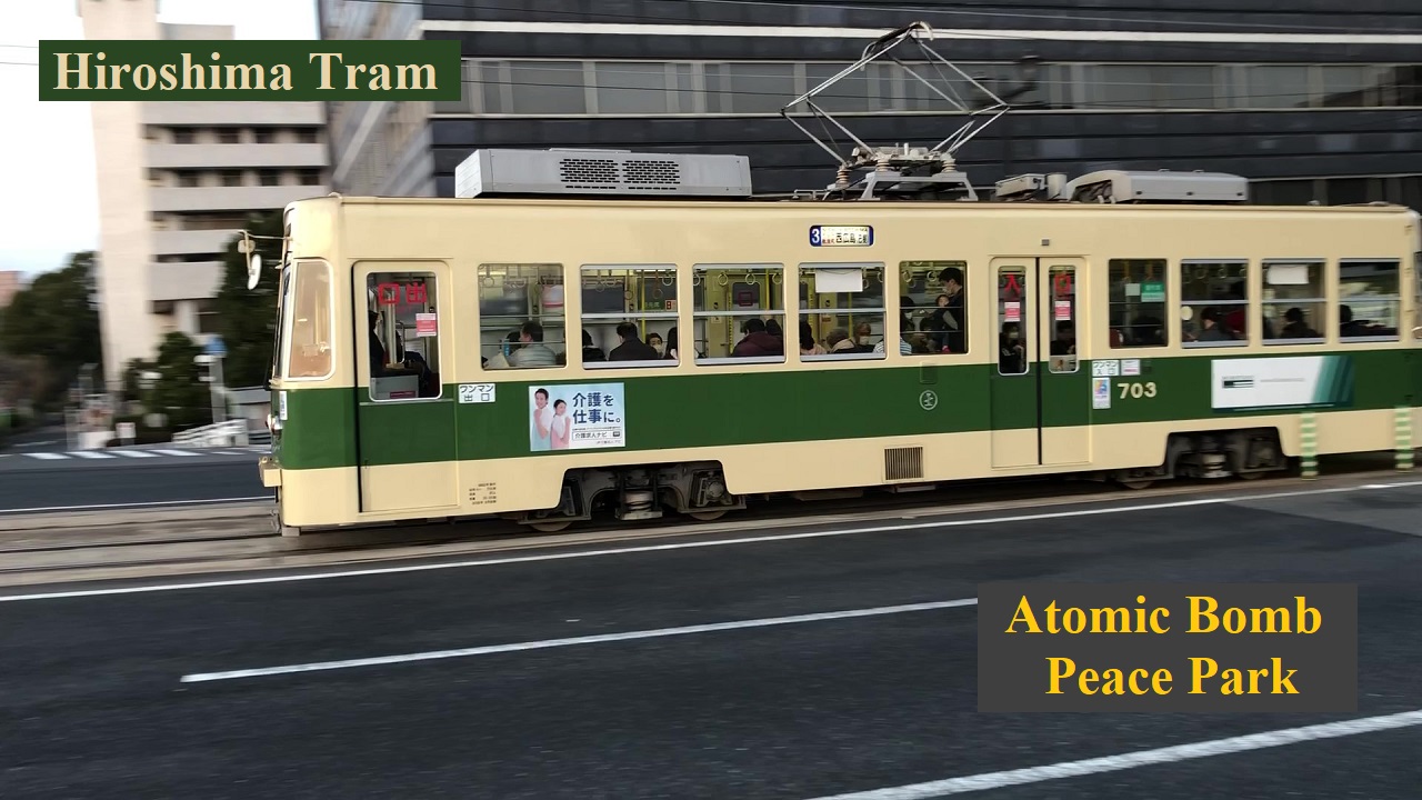 Old Hiroshima tram set running by peace park